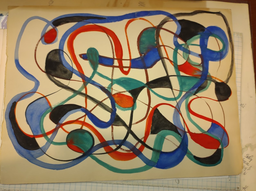 Blue, red, black, green swirls on white paper, like a doodle.