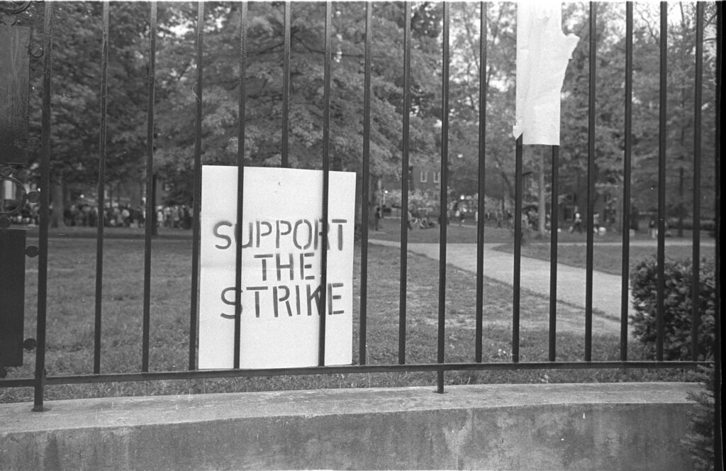 "Support the Strike" sign on fence around Ohio University College Green. Photo by Peter L. Goss.