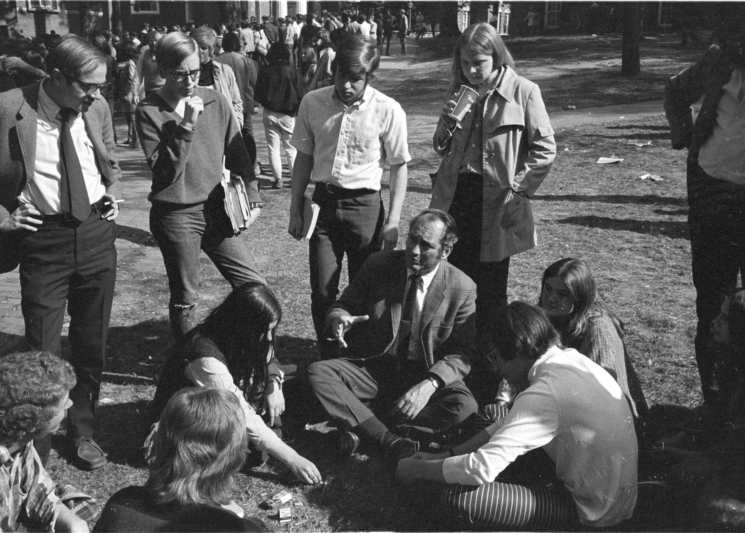 Small group of students gathered on College Green during a teach-in