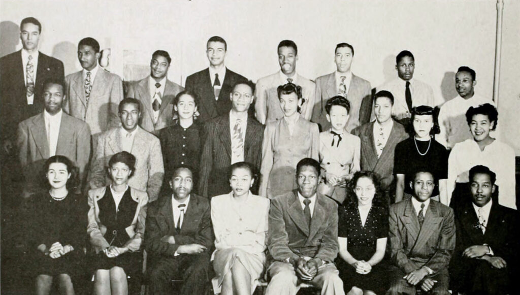 Group of multicultural college students pose for yearbook photo