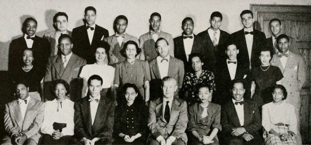 Group of multicultural college students pose for yearbook photo