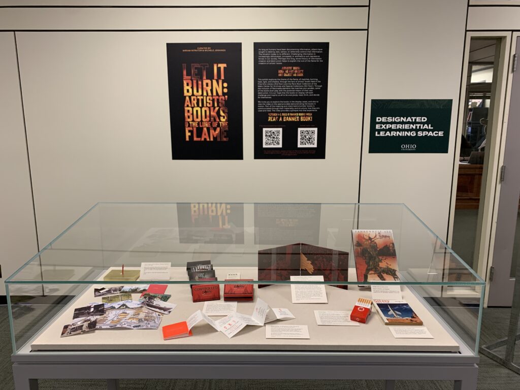 View of one display case for the exhibit, Let It Burn: Artists’ Books and the Lure of the Flame