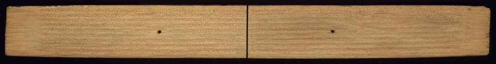 Front side of palm leaf manuscript with inscribed text