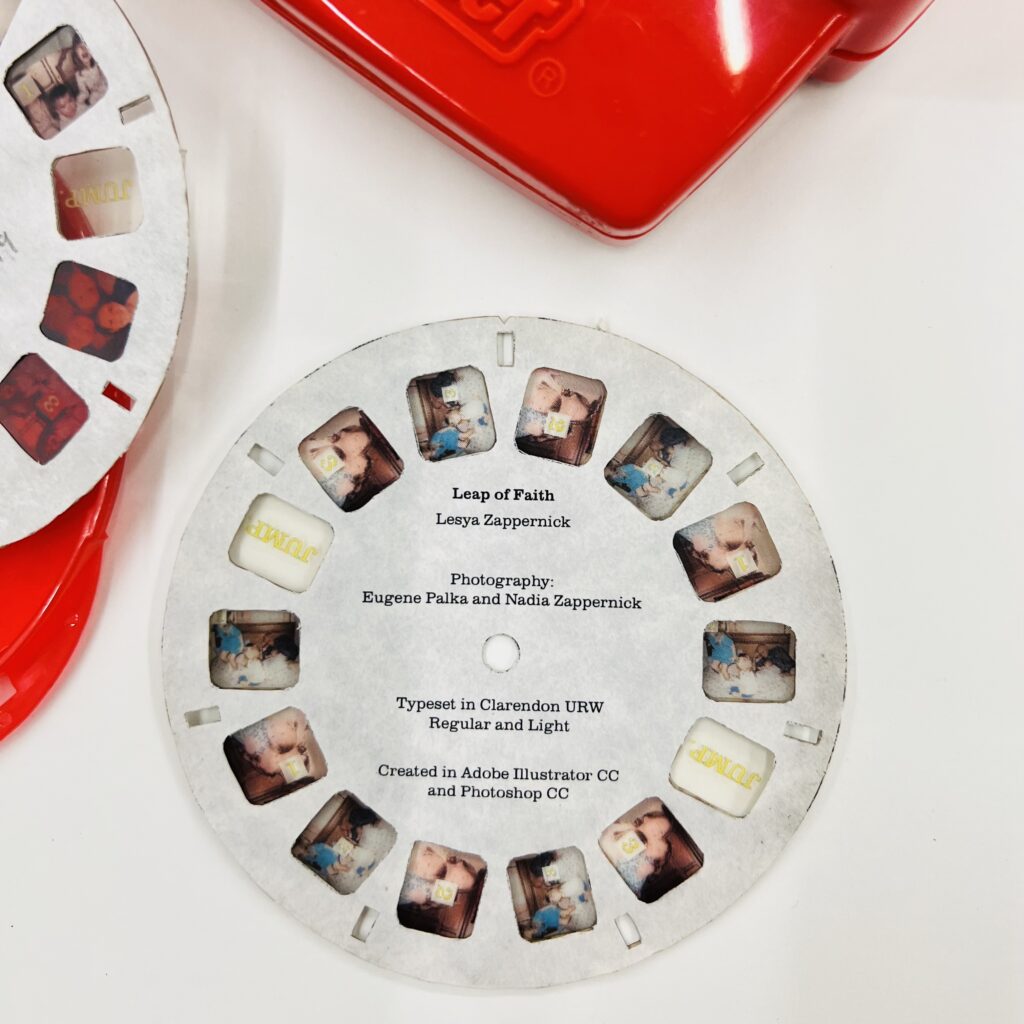 Leap of Faith by Lesya Zappernick. Created in 2019 for Letterpress & Bookmaking with instructor Don Adleta. Red Plastic ViewMaster with laser-printed photos and hand-cut cardboard reels. Photographs by Eugene Palka and Nadia Zappernick.