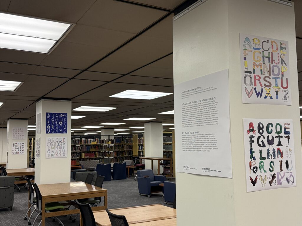 View of select student typography posters hanging on Alden Library 3rd floor.