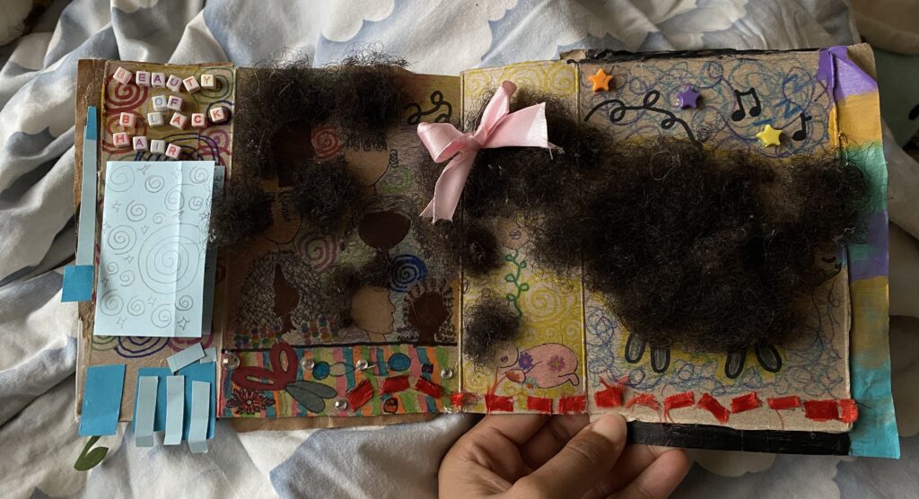 View of Fullen's book. Each illustration features a different hairstyle created out of Fullen's own hair.