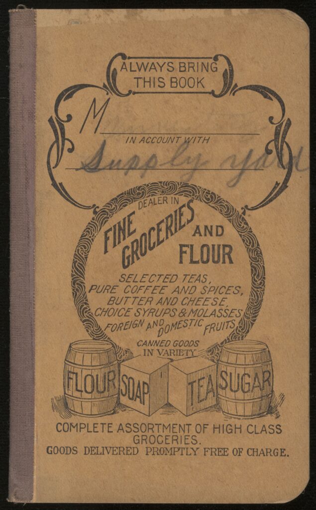 Front cover of store ledger with printed graphic of dry good barrels and some handwritten text