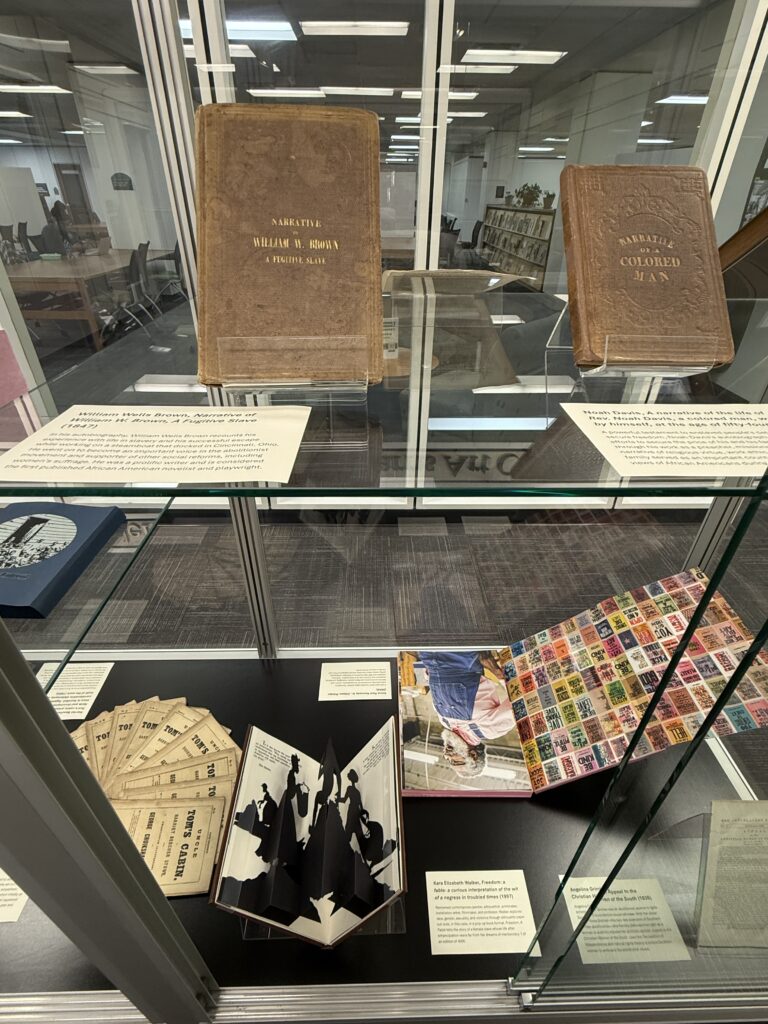 View of books on display in the "Enslavement & Abolition in Antebellum Texts & Contemporary Artists’ Books" exhibit