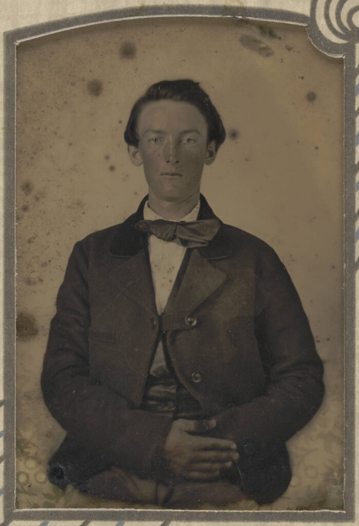 Black and white glass portrait of Jonathan Perkins Weethee as a young man.