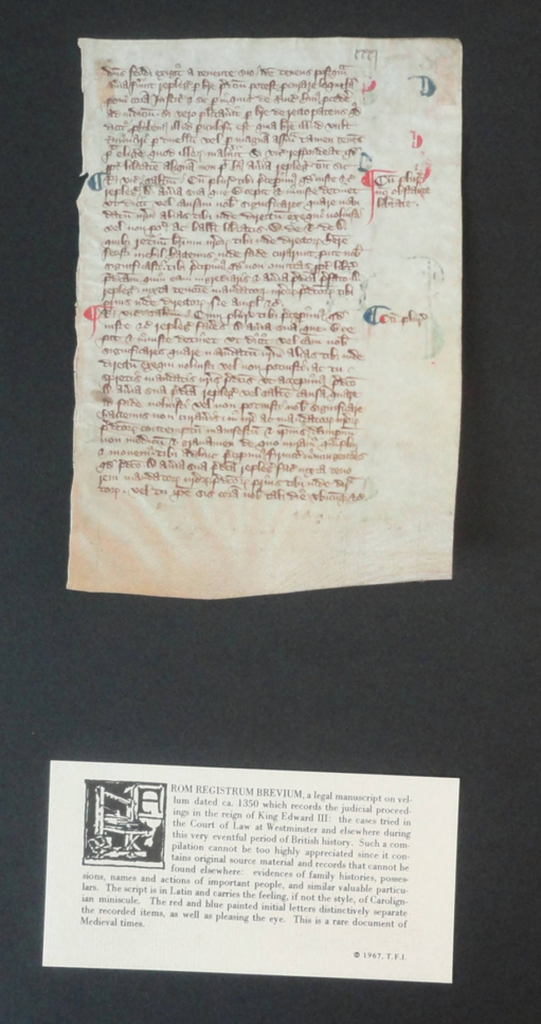 Example of how leaves came packaged originally-the leaf would’ve been glued to a piece of black cardboard with the informational label pasted below. This is Memorial University of
Newfoundland’s #8 leaf, Registrum Brevium, a legal manuscript from 1350. Courtsey of MUN Libraries Archives and Special Collections. Link to digital item in MUN's collection.